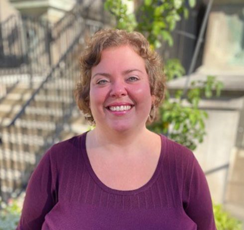 a woman smiling at camera